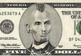 Five dollar bill where Lincoln has mohawk haircut.